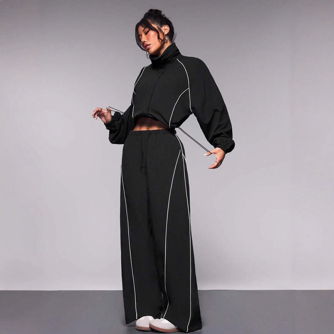 Damen sportives Cropped Windbreaker-Set mit Stehkragen Tunnelzug und reflektierenden Paspeln Nord Taschen