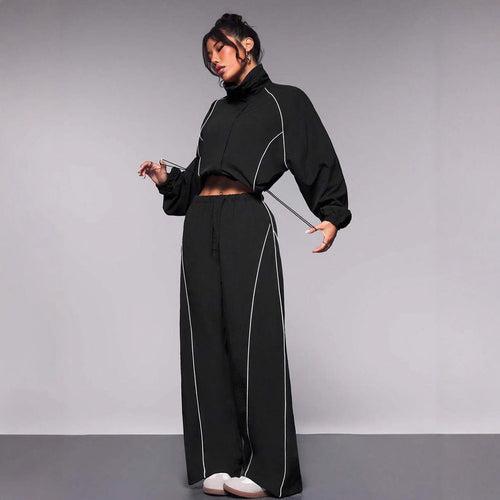 Damen sportives Cropped Windbreaker-Set mit Stehkragen Tunnelzug und reflektierenden Paspeln Nord Taschen