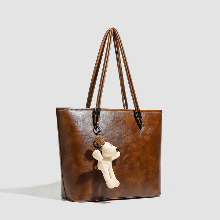 Damen Shopper-Tasche aus hochwertigem Kunstleder mit verspieltem Anhänger Nord Taschen