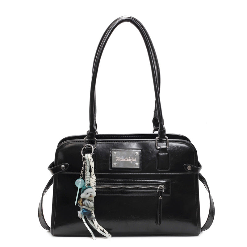 Damen Handtasche mit dekorativem Anhänger | Nord Taschen