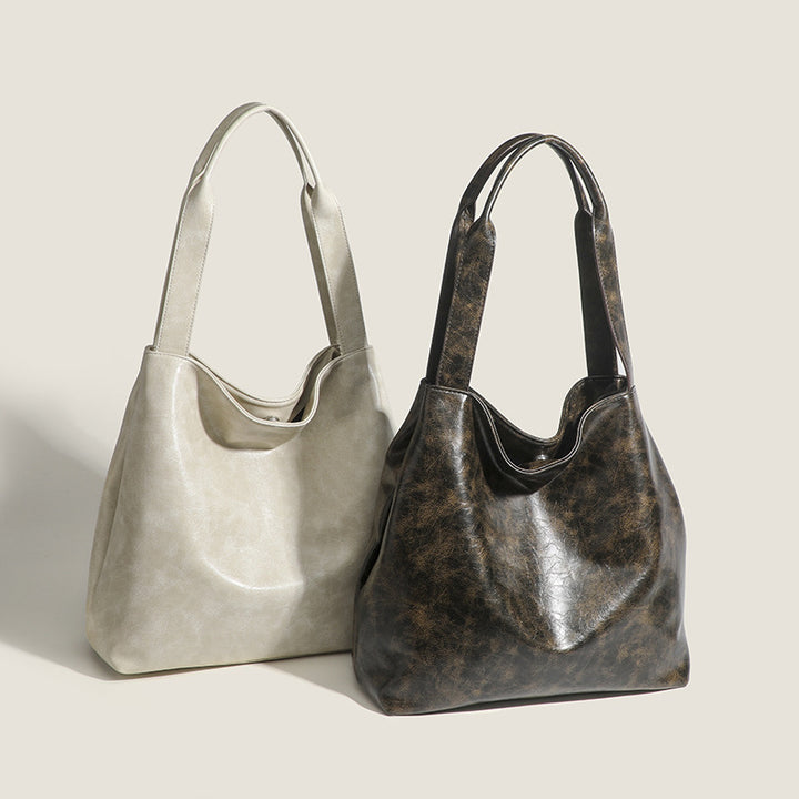 Damen Hobo-Tasche aus hochwertigem Kunstleder mit elegantem, geschwungenem Design Nord Taschen