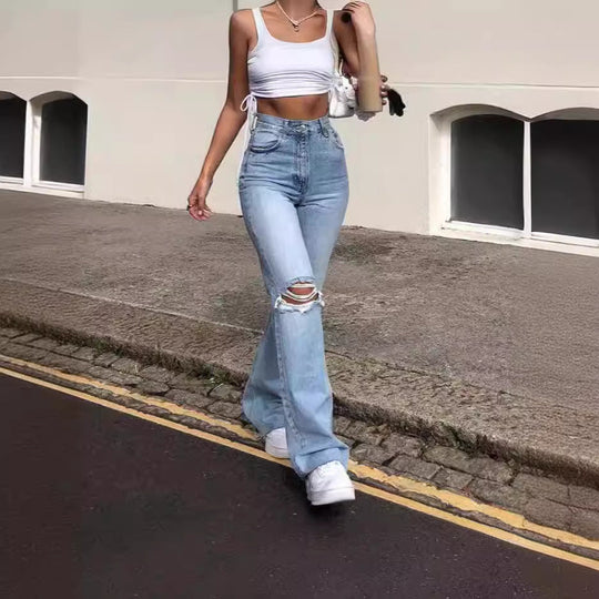Damen Vintage Schlagjeans mit modischen Rissdetails und hohem Bund