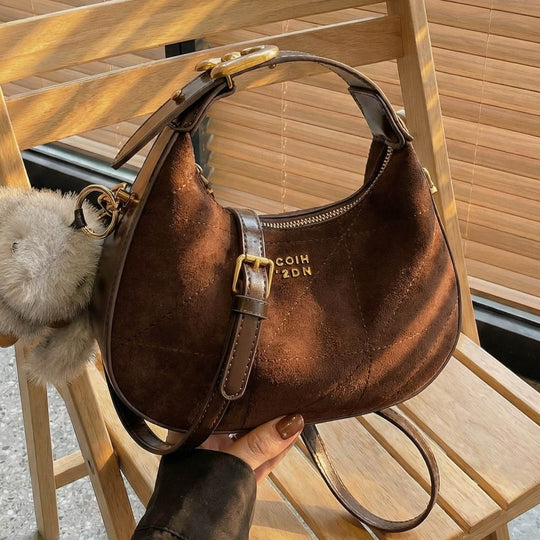 Damen Henkeltasche aus weichem Veloursleder mit abnehmbarem Plüschanhänger Nord Taschen
