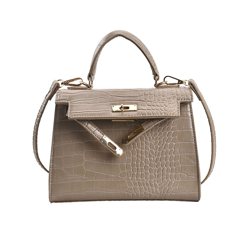 Damen Handtasche im luxuriösen Krokodil-Look mit goldenen Details | Nord Taschen