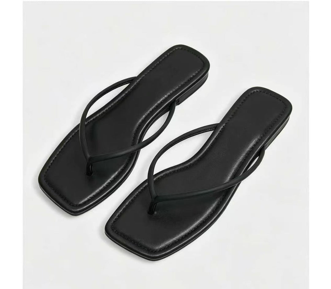 Damen Elegante und flache Zehentrenner mit minimalistischen Riemen