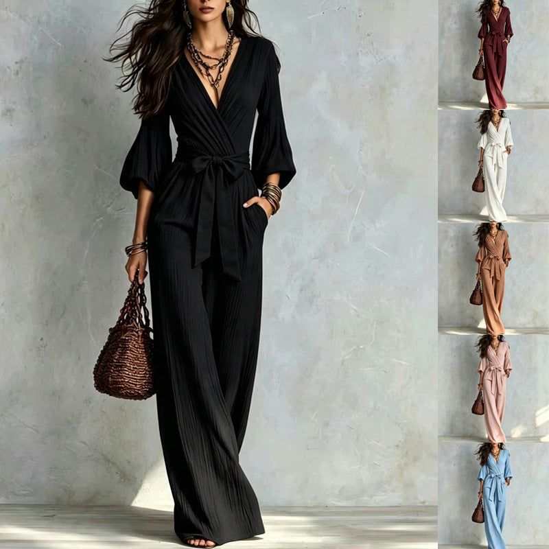 Damen Jumpsuit Wickel-Optik mit weitem Bein, Taillengürtel und Glockenärmeln Nord Taschen
