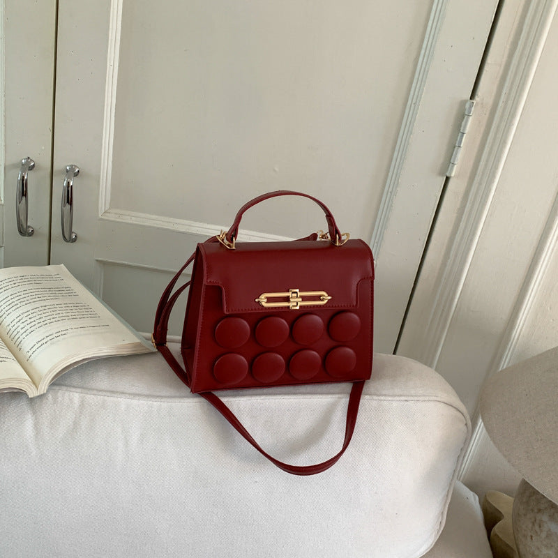Damen-Handtasche mit strukturiertem Dekor und praktischem Tragegriff Nord Taschen