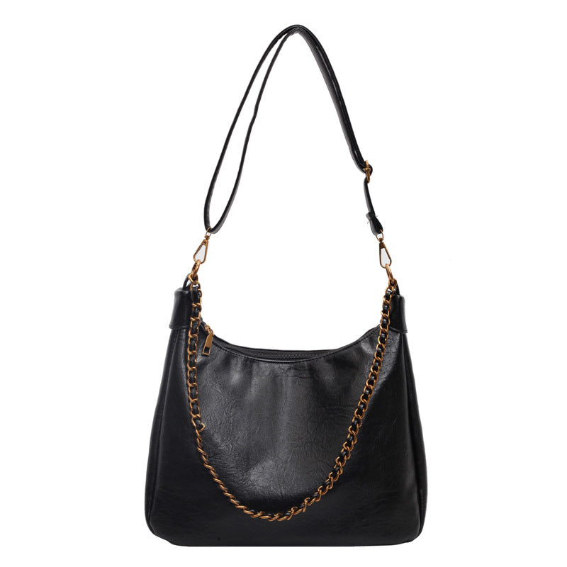 Damen stylische Umhängetasche mit goldenen Kettendetails Nord Taschen