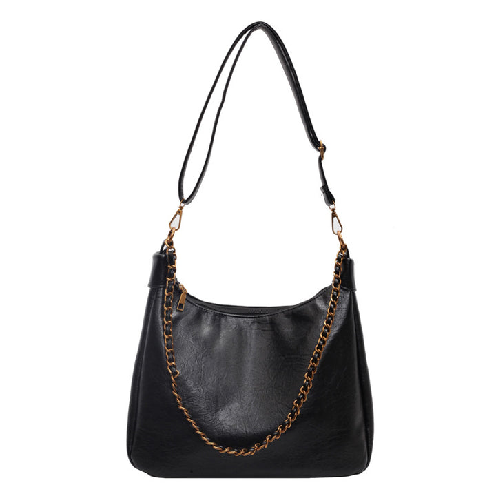 Damen stylische Umhängetasche mit goldenen Kettendetails Nord Taschen