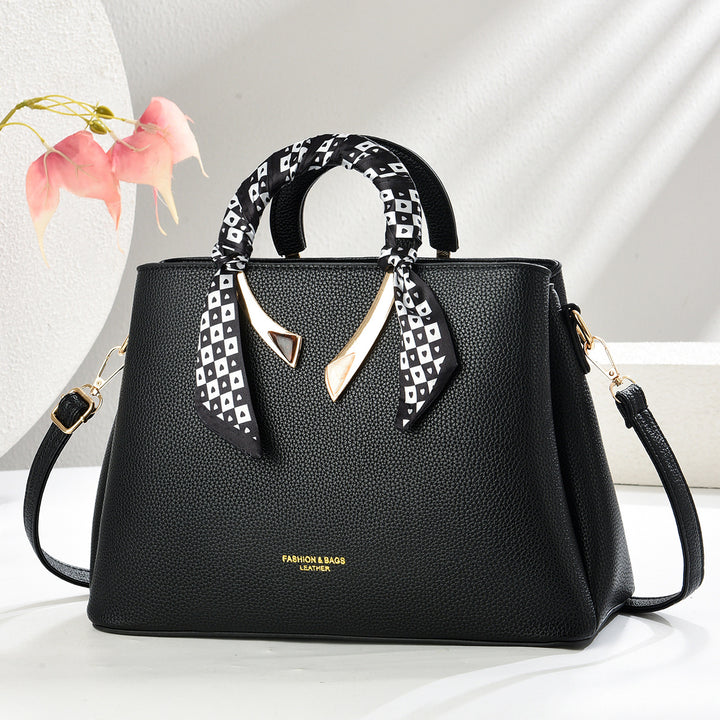 Damen elegante Handtasche mit dekorativer Schal-Applikation Nord Taschen