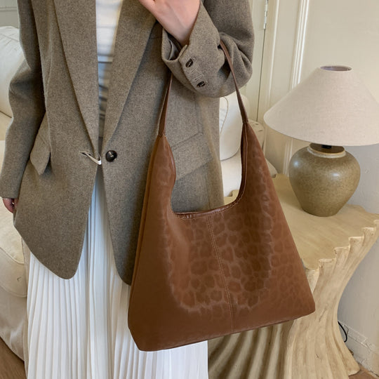 Damen Hobo-Tasche aus hochwertigem Kunstleder mit elegantem Leodruck Nord Taschen