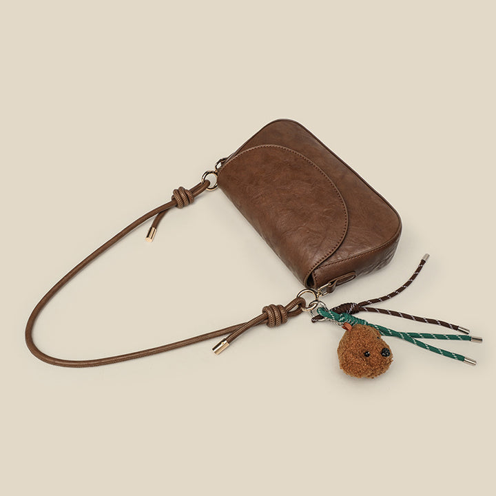 Damen Clutch-Tasche mit verspieltem Anhänger Nord Taschen