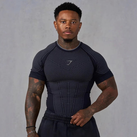 Herren nan muskelmodellierendes Funktionsshirt mit 3D-Struktur und gezielten Kompressionszonen Nord Taschen