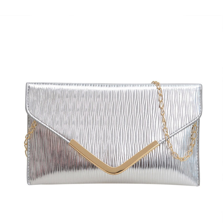 Damen elegante Clutch mit strukturiertem Obermaterial und goldenen Akzenten Nord Taschen