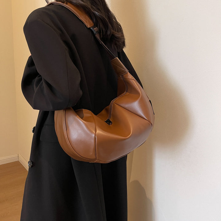 Damen Umhängetasche aus weichem Kunstleder mit modernem Design Nord Taschen