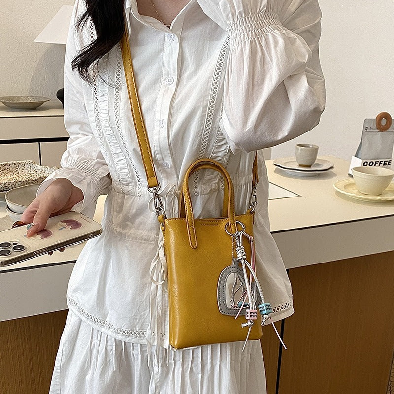 Damen Mini-Handtasche mit elegantem Anhänger Nord Taschen