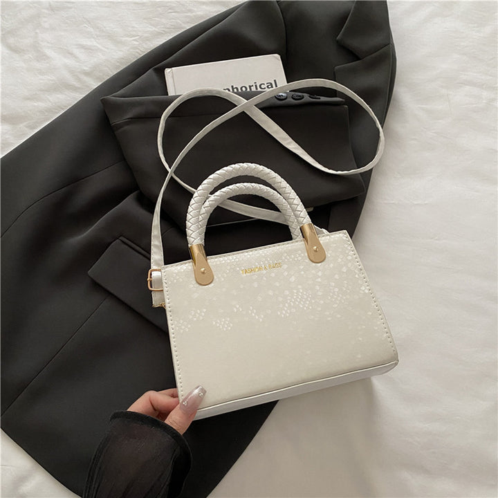 Damen Designer Handtasche mit strukturiertem Obermaterial und goldenen Akzenten Nord Taschen
