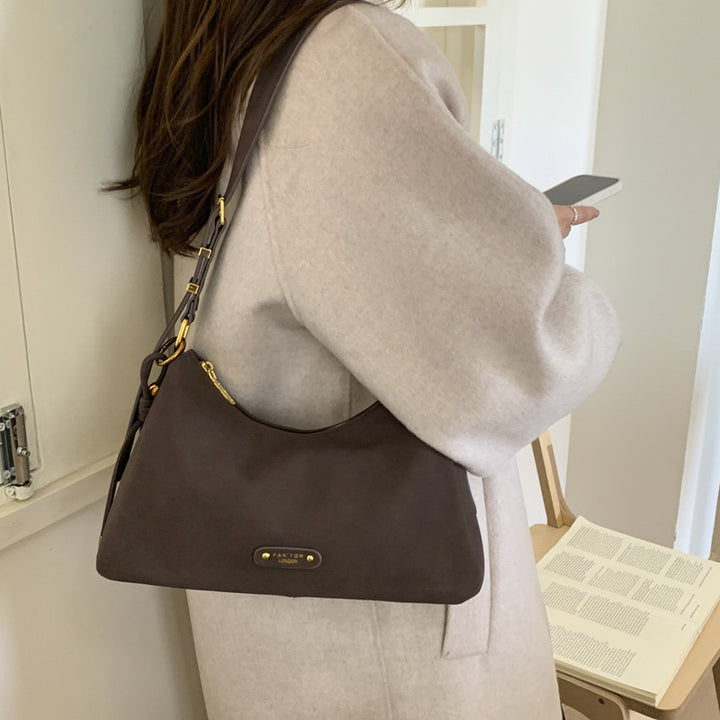 Damen Hobo-Tasche aus weichem Kunstleder mit dekorativen Details Nord Taschen