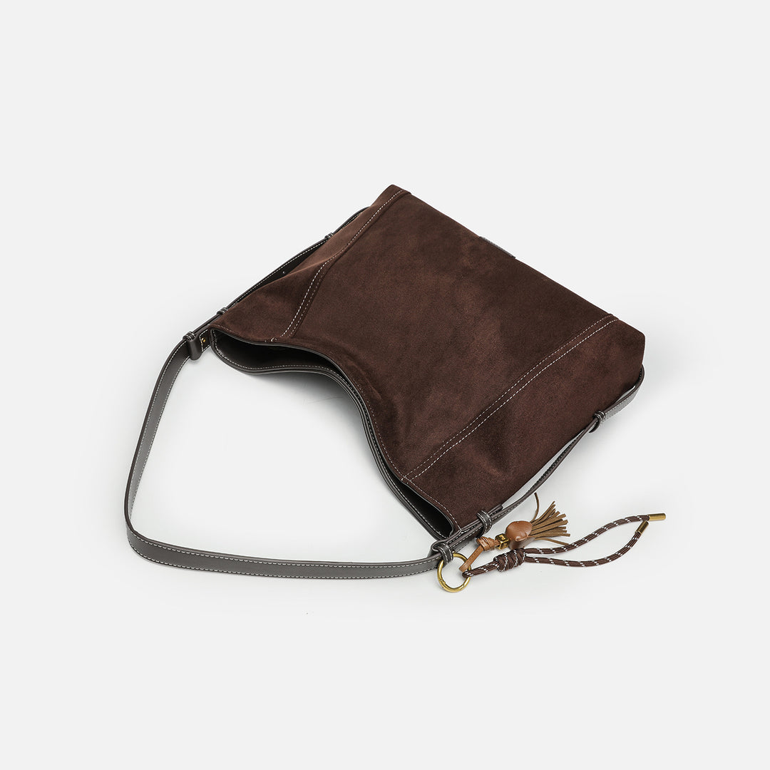 Damen Hobo Tasche mit elegantem Leder und dekorativen Quasten Nord Taschen
