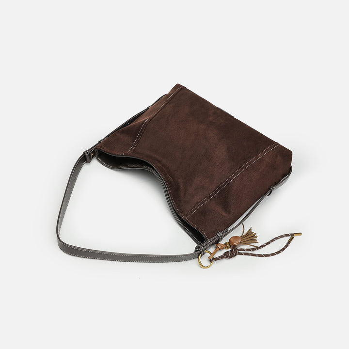 Damen Hobo Tasche mit elegantem Leder und dekorativen Quasten Nord Taschen