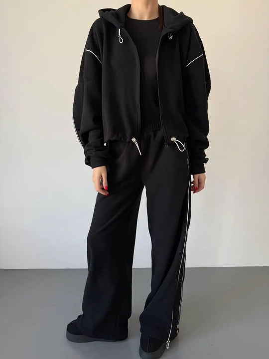 Damen gekürztes Zip-Hoodie mit Tunnelzug und hochgeschnittener weiter Fleece-Loungehose Nord Taschen
