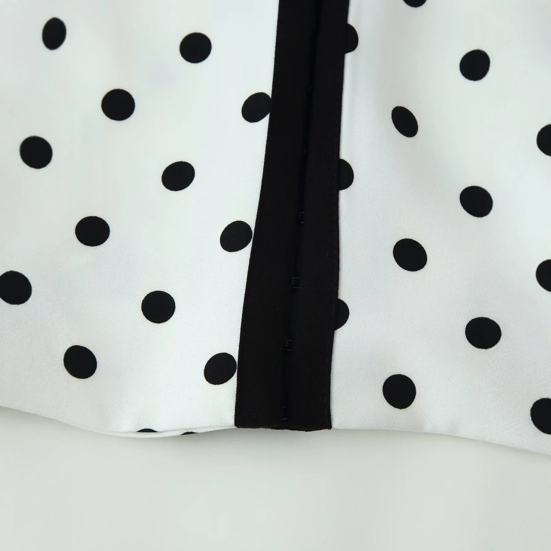 Damen Kurzblazer im Polka-Dot-Design mit Rundhalsausschnitt, kurzem Schnitt und Kontrastpaspeln Nord Taschen