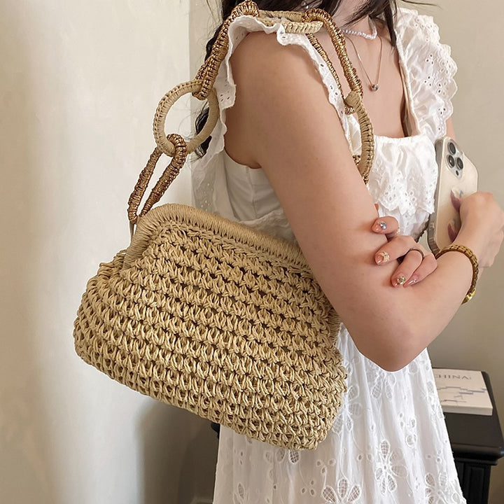 Damen-Handtasche aus geflochtenem Material mit dekorativen Griffen Nord Taschen