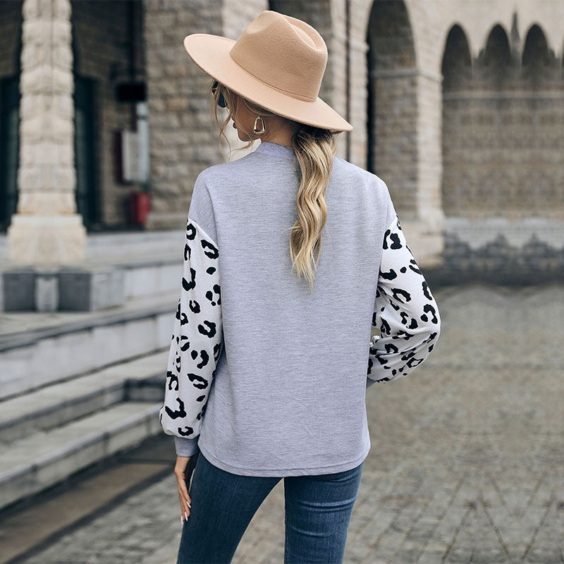 Damen Lässiger Pullover mit Leopardenärmel Nord Taschen