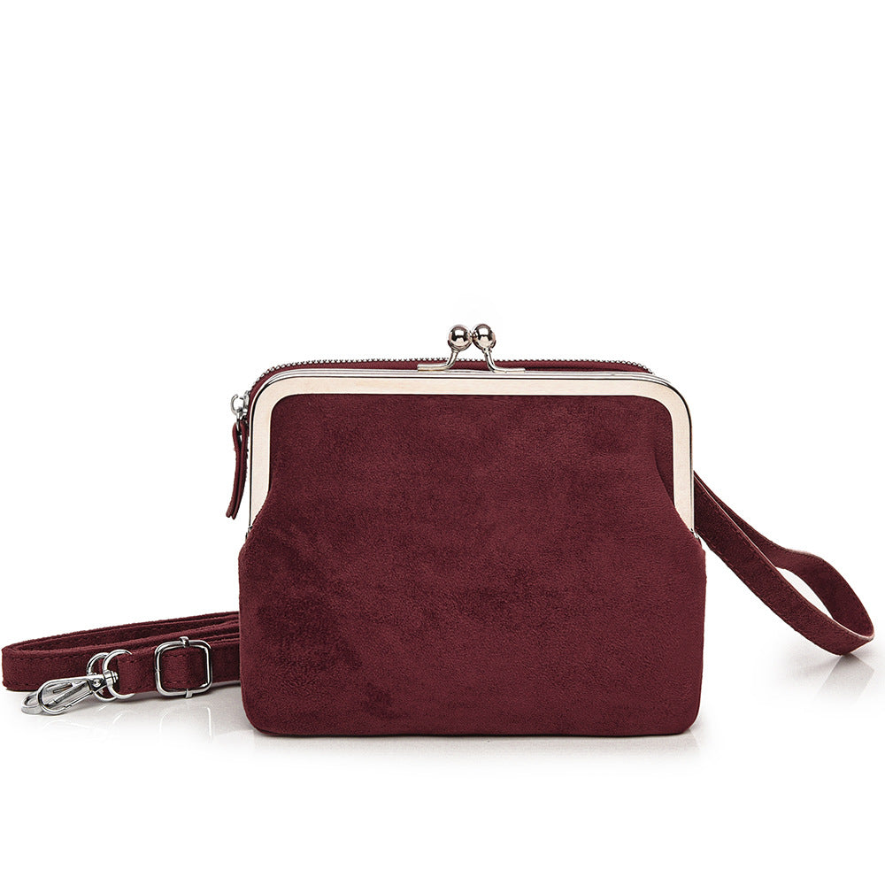 Damen Clutch mit dekorativem Metallverschluss Nord Taschen