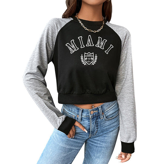 Damen Kurzgeschnittenes College-Cropped-Sweatshirt mit Raglanärmeln und elastischem Saum Nord Taschen
