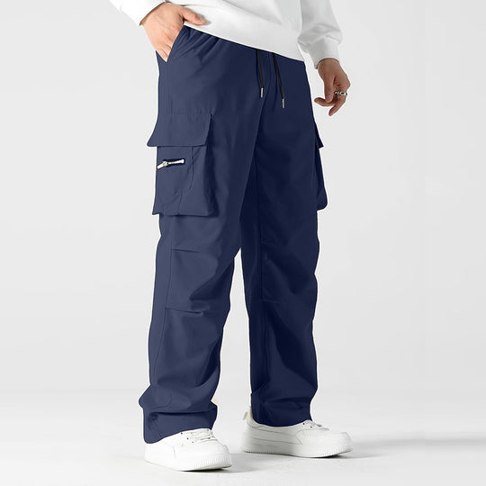 Herren weite Utility-Cargohose mit Tunnelzugbund, Knieabnähern und Multifachtaschen Nord Taschen