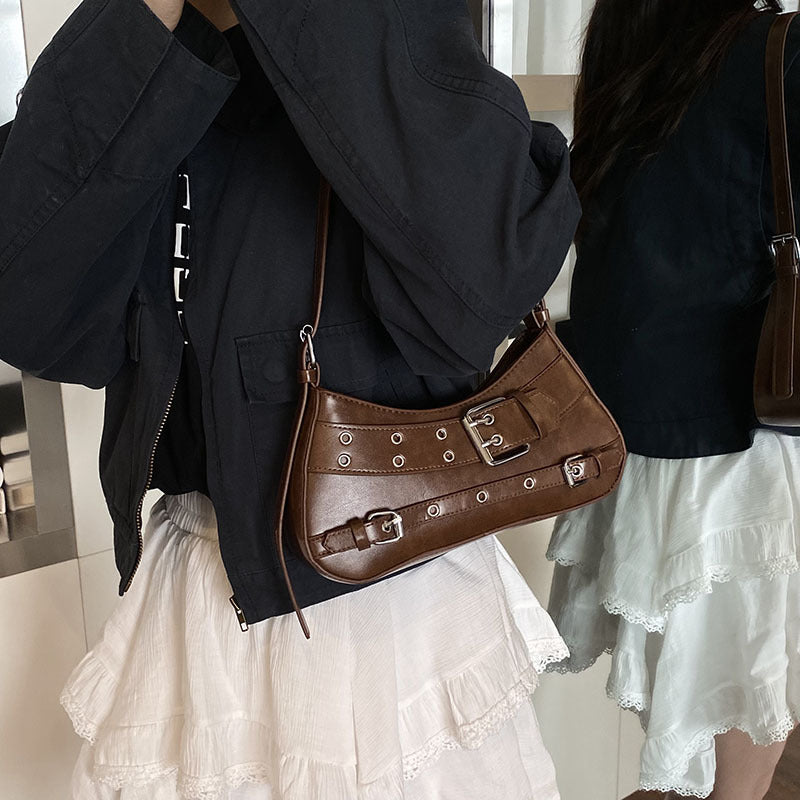 Damen Handtasche mit verstellbarem Trageriemen und dekorativen Schnallen Nord Taschen