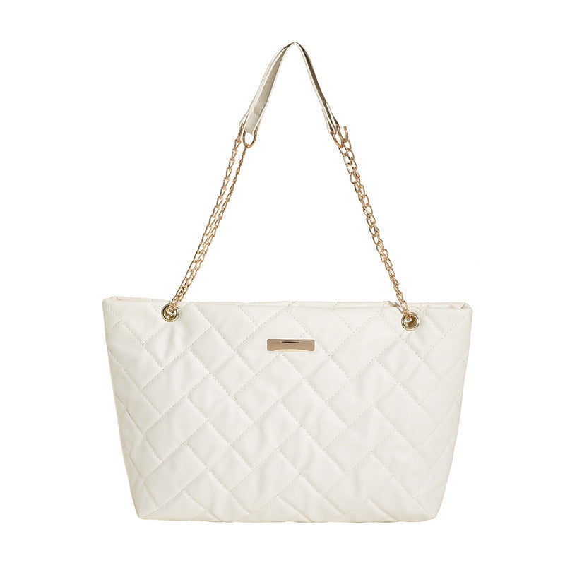 Damen elegante Stepp-Handtasche mit goldenen Akzenten Nord Taschen
