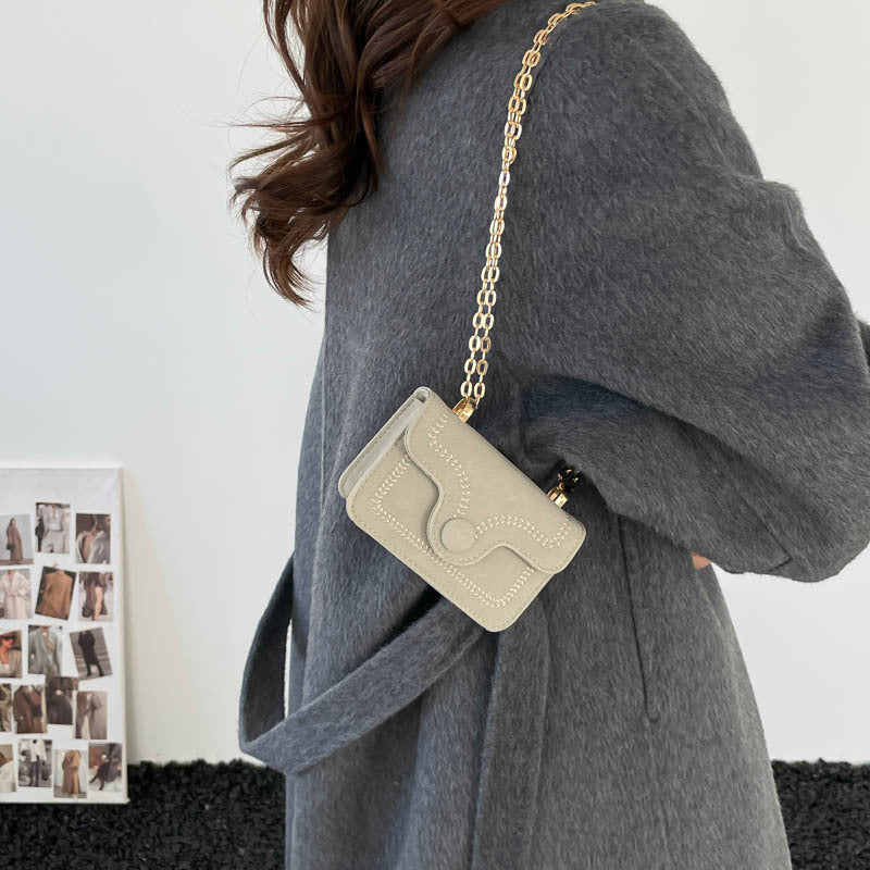 Damen Mini-Henkeltasche mit elegantem Steppmuster und goldenen Akzenten Nord Taschen