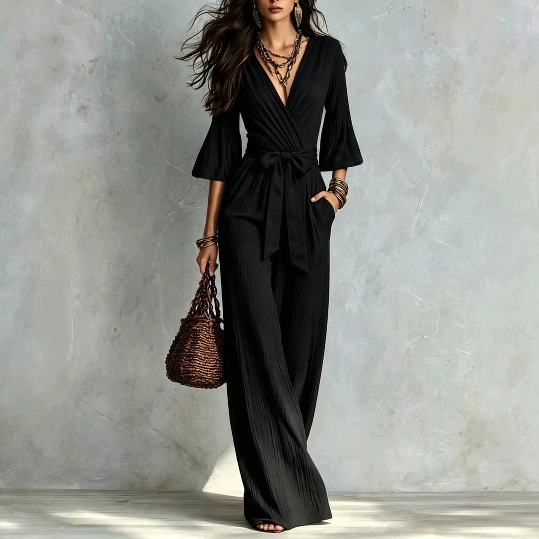 Damen Jumpsuit Wickel-Optik mit weitem Bein, Taillengürtel und Glockenärmeln Nord Taschen