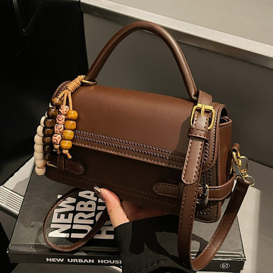 Damen elegante Umhängetasche mit kunstvoll geflochtenen Details Nord Taschen