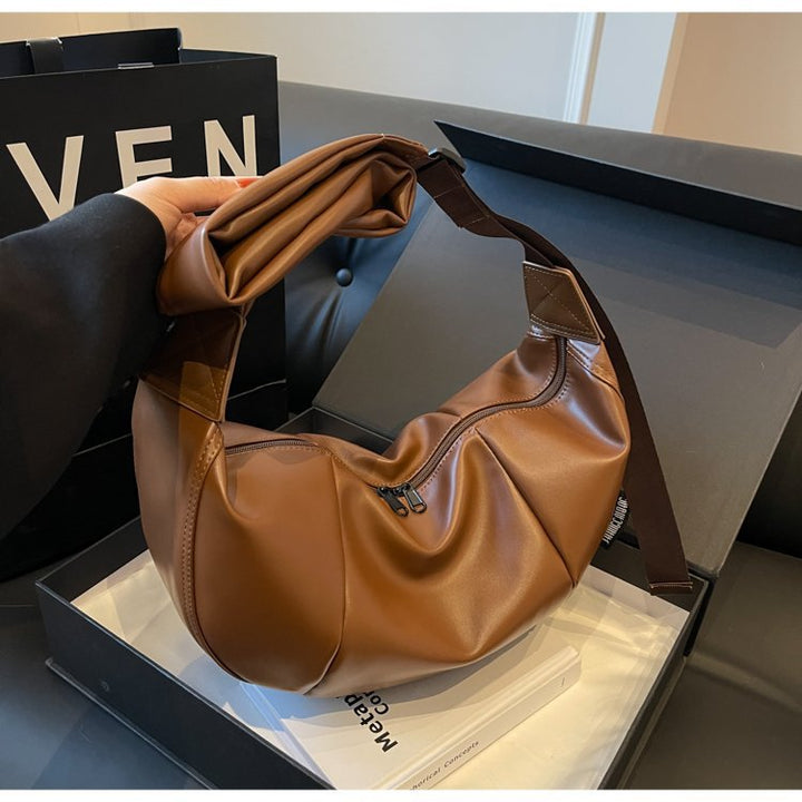 Damen Umhängetasche aus weichem Kunstleder mit modernem Design Nord Taschen