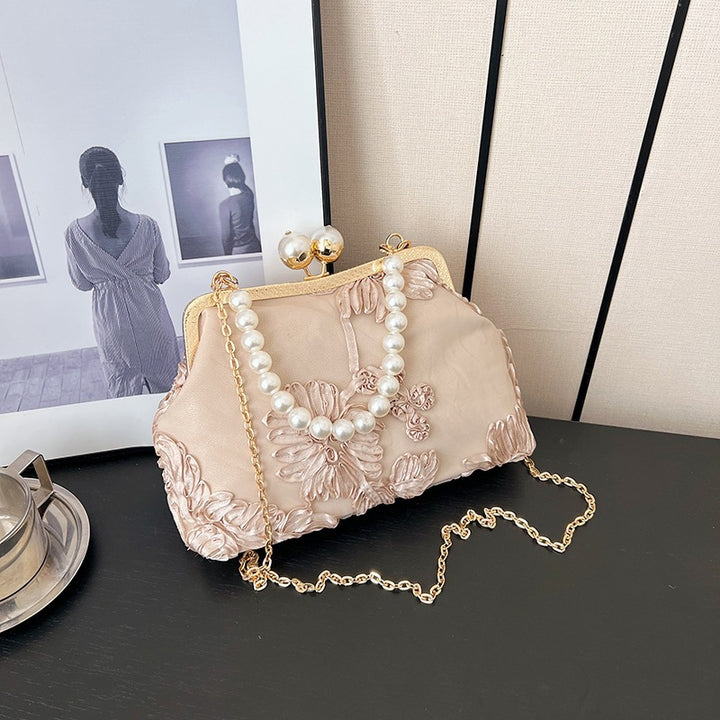 Damen elegante Clutch mit floralen Stickereien und Perlenakzenten Nord Taschen