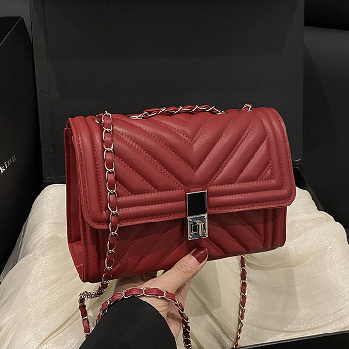 Damen Handtasche mit innovativem Ketten-Riemen Nord Taschen