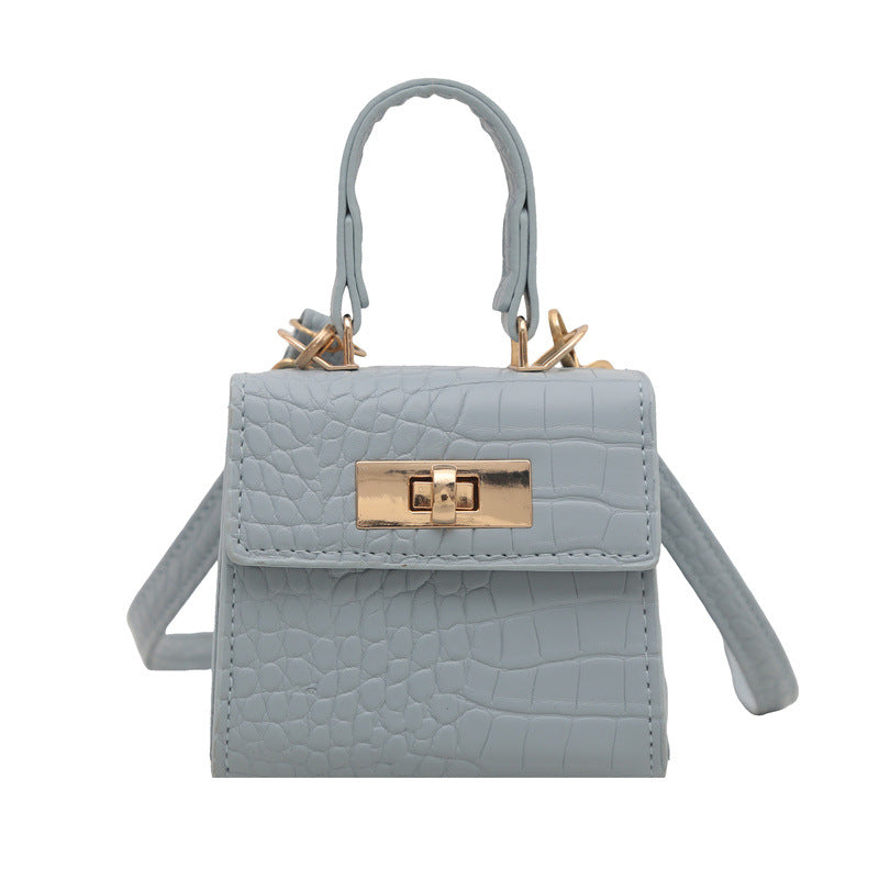 Damen Mini-Tasche mit edler Kroko-Optik und goldenen Akzenten Nord Taschen