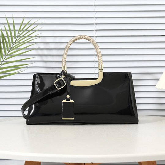 Damen elegante Handtasche mit glänzender Oberfläche und geflochtenen Tragegriffen Nord Taschen