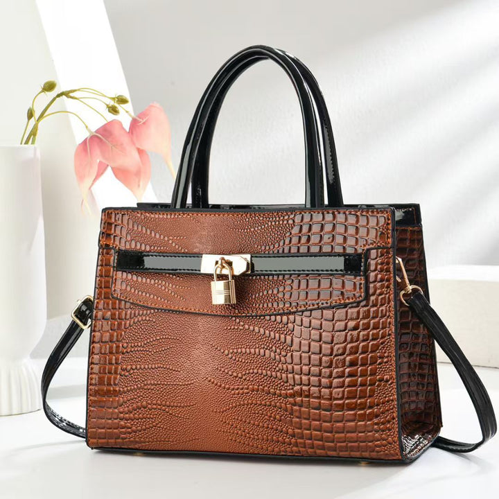 Damen elegante Handtasche mit Schlangenleder-Optik Nord Taschen