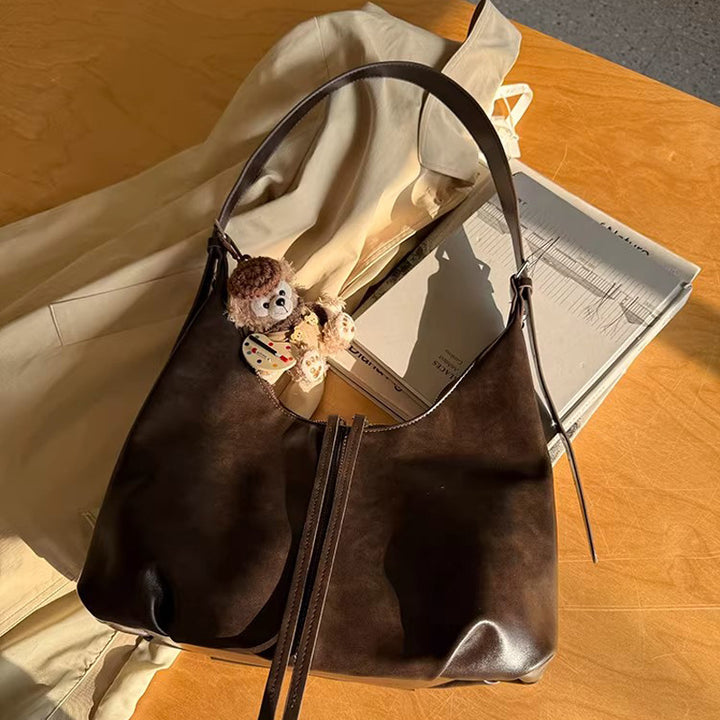 Damen Hobo-Tasche aus geschmeidigem Kunstleder mit flexiblem Tragegriff Nord Taschen