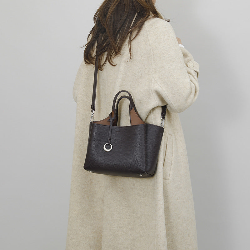 Damen elegante Handtasche mit modernem Lederdesign und verstellbarem Schulterriemen Nord Taschen