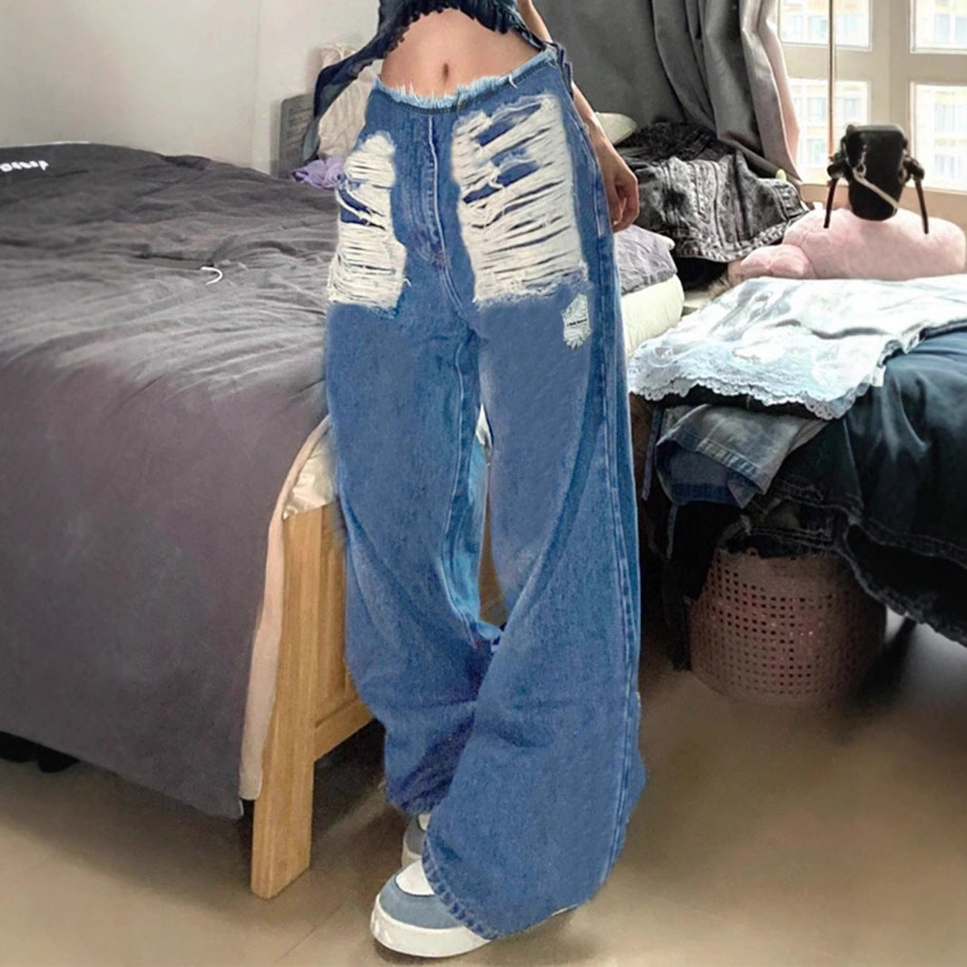Damen hochgeschnittene weite Jeanshose aus Denim mit stark zerstörter Front und rohem Bund Nord Taschen