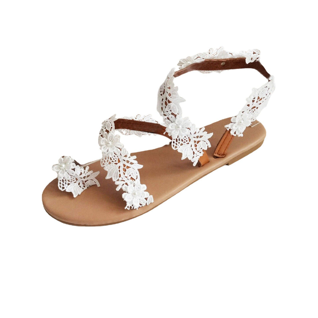 Damen Elegante und zarte Riemchen-Sandalen mit floralen Details