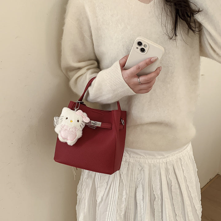 Damen Mini-Handtasche mit süßem Anhänger Nord Taschen