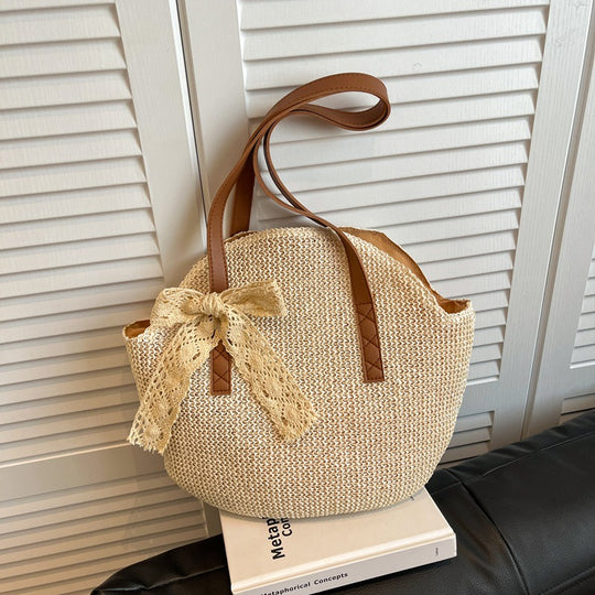 Damen stilvolle Handtasche aus geflochtenem Material mit charmanten Details Nord Taschen