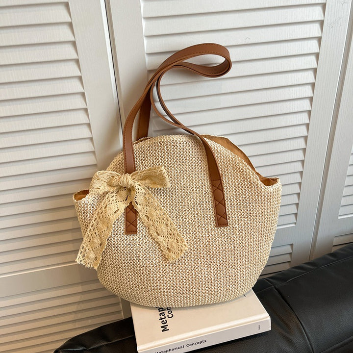 Damen stilvolle Handtasche aus geflochtenem Material mit charmanten Details Nord Taschen