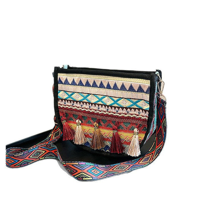 Damen umhängetasche mit kreativem Stickmuster und Quasten Nord Taschen